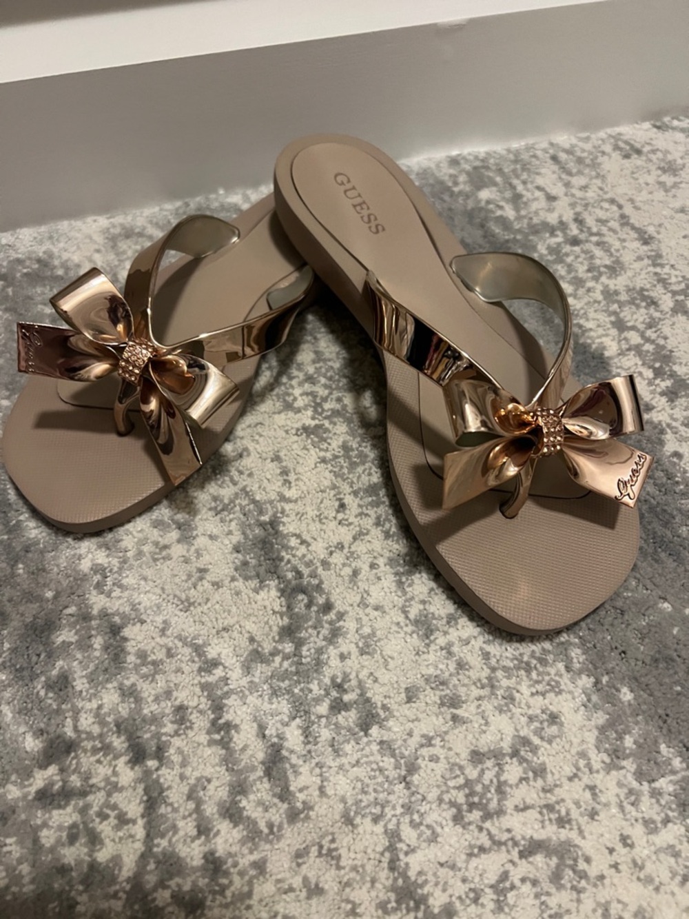 GUESS Rose Gold Metallic Bow Thong Sandals with Taupe Footbed